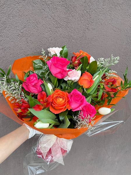 Orange and Pink mixed flowers bouquet