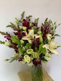 White and Burgundy Flowers in Vase