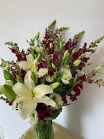 White and Burgundy Flowers in Vase