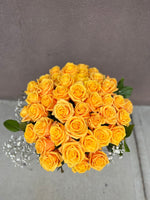 50 stems of yellow rose with a vase