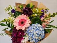 Purple & Blue mixed flowers in the box