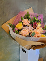 Peach and Yellow mixed flowers in the box