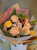 Peach and Yellow mixed flowers in the box
