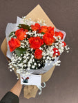 Dozen Orange Roses bouquet