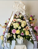 Sympathy Arrangement of White, Yellow, and Purple Roses